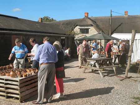 Visitors choosing pots