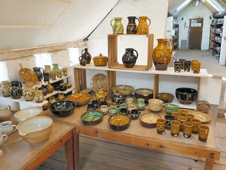 Slipware pots for sale in the showroom