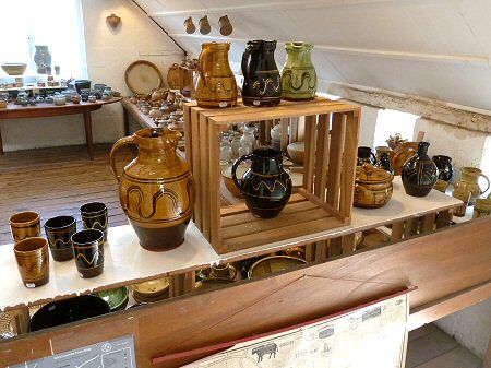 Slipware pots for sale in the showroom