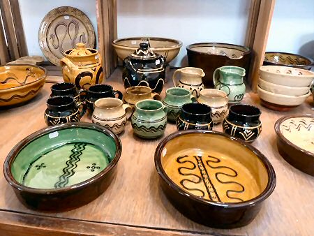 Slipware pots for sale in the showroom