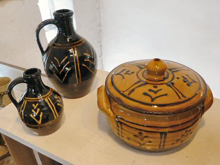 Slipware pots for sale in the showroom