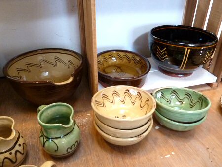 Slipware pots for sale in the showroom