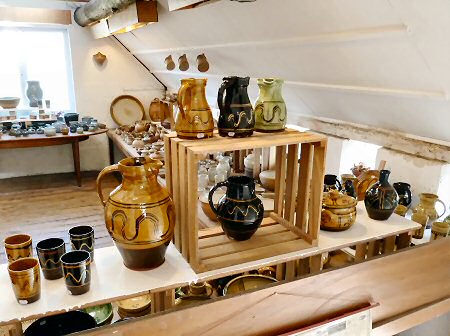 Slipware pots for sale in the showroom